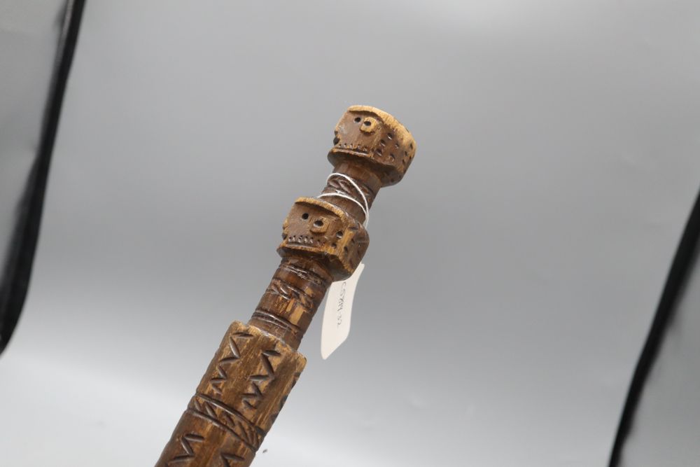 A geometric carved tribal walking cane, c.1840, length 100cm